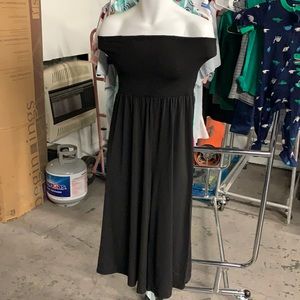 Black silky off shoulder jumpsuit. Size M